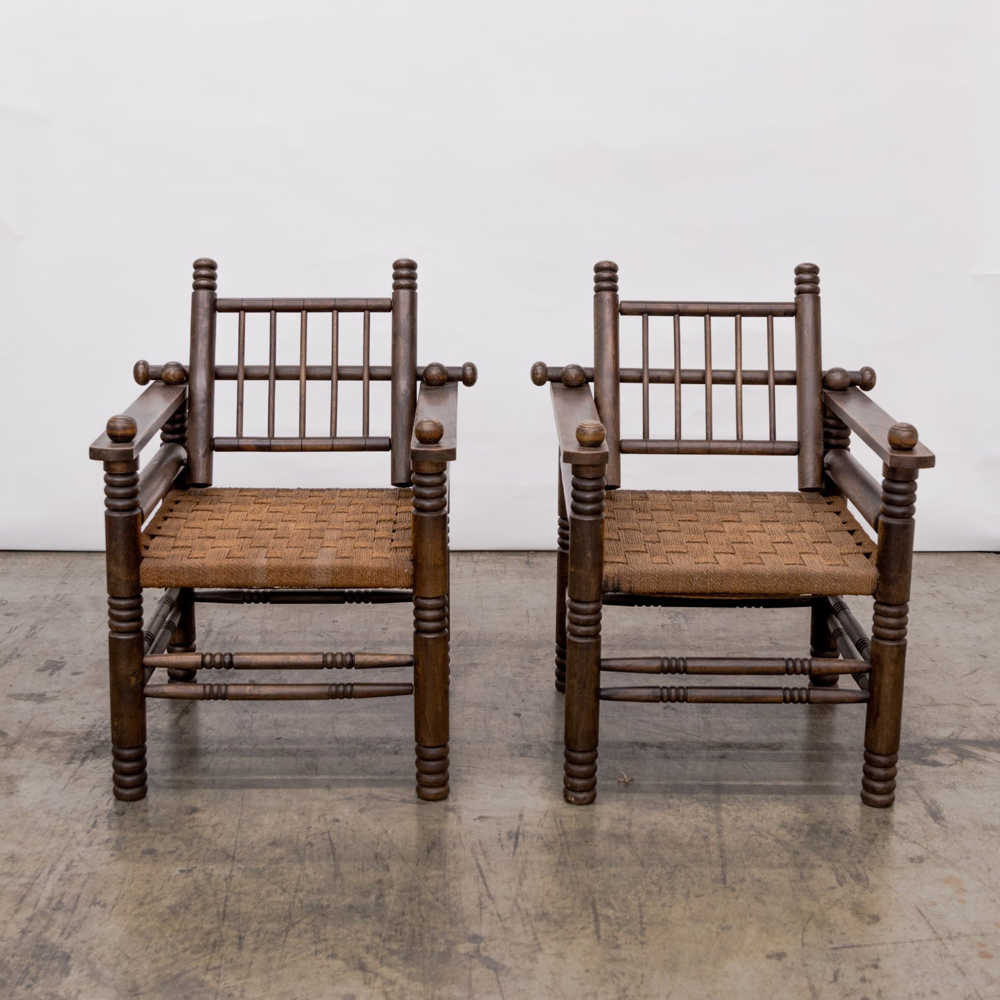 Charles Dudouyt | Turned Walnut + Rush Seat Armchairs