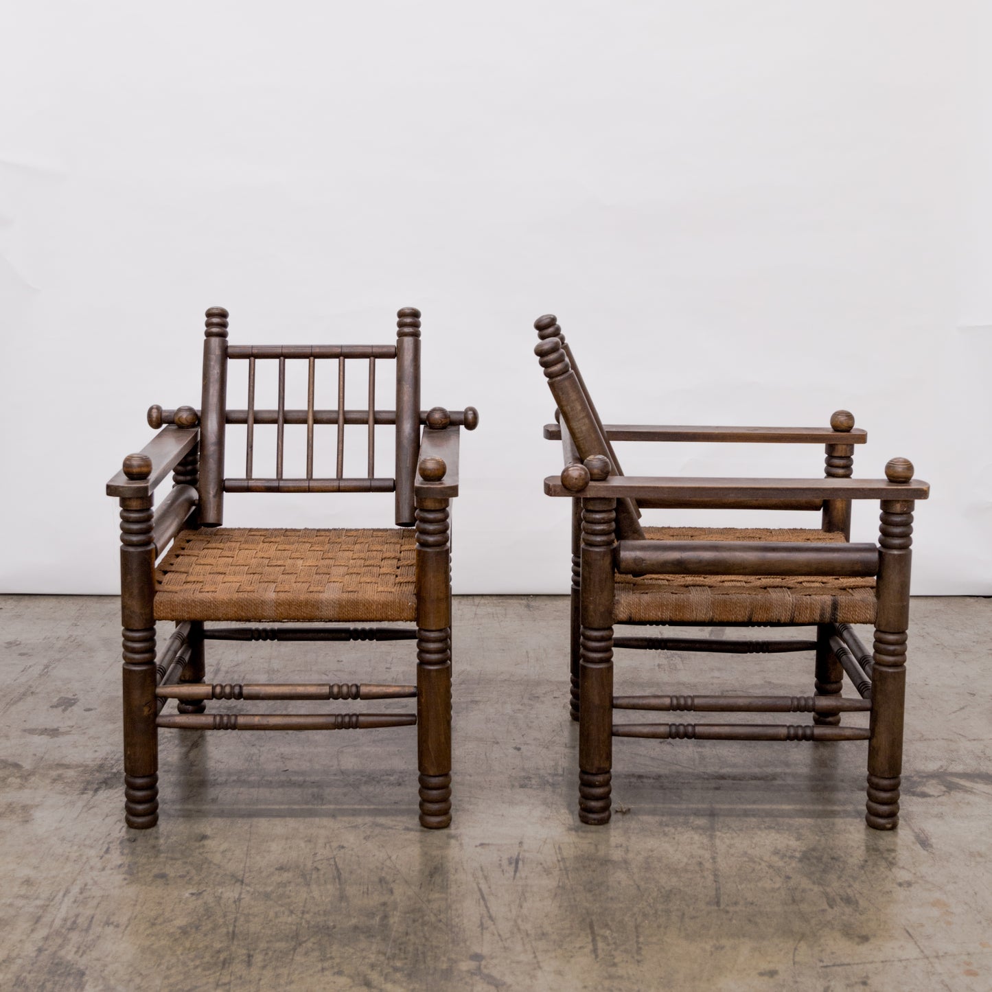 Charles Dudouyt | Turned Walnut + Rush Seat Armchairs