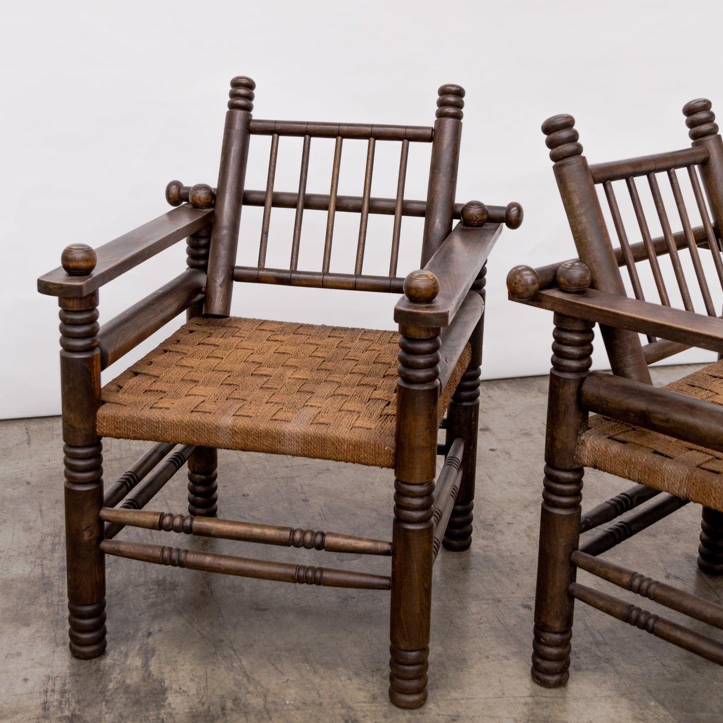 Charles Dudouyt | Turned Walnut + Rush Seat Armchairs